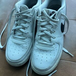 Nike White Sneakers with Black Swoosh